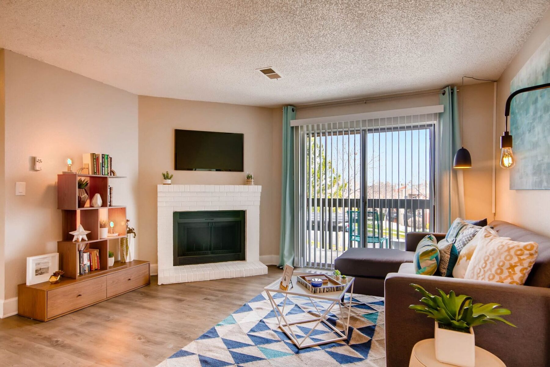 Living room with fire place and patio access