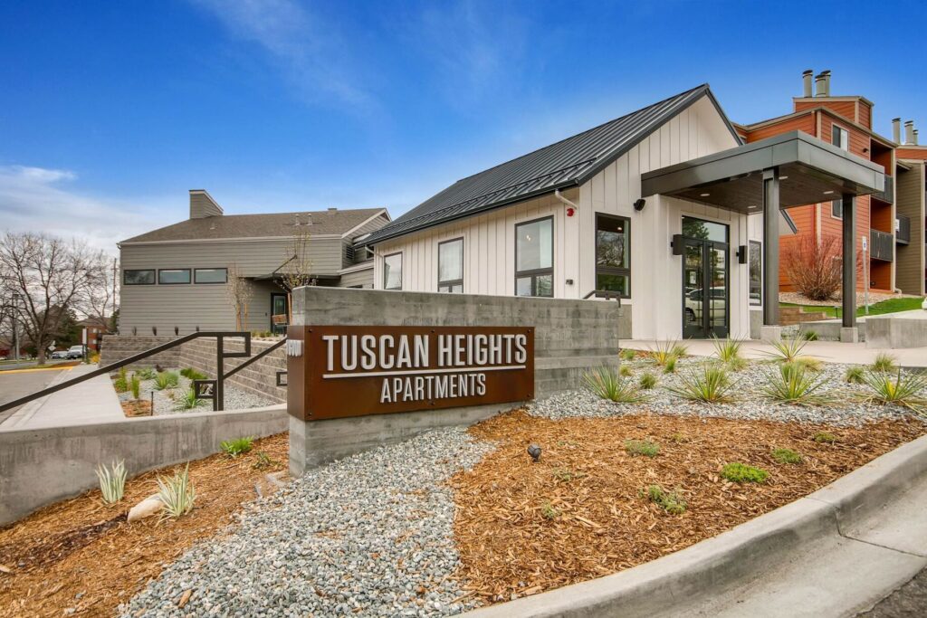 Leasing office exterior with monument sign