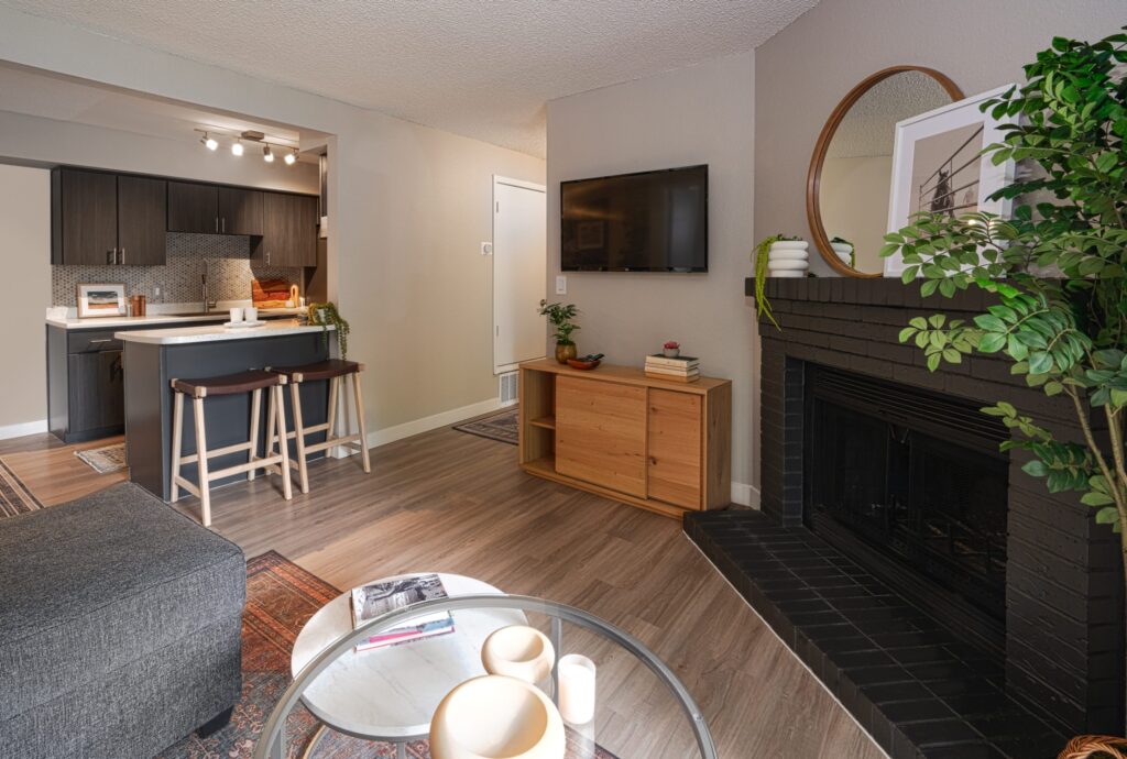 Living room with fire place and patio access